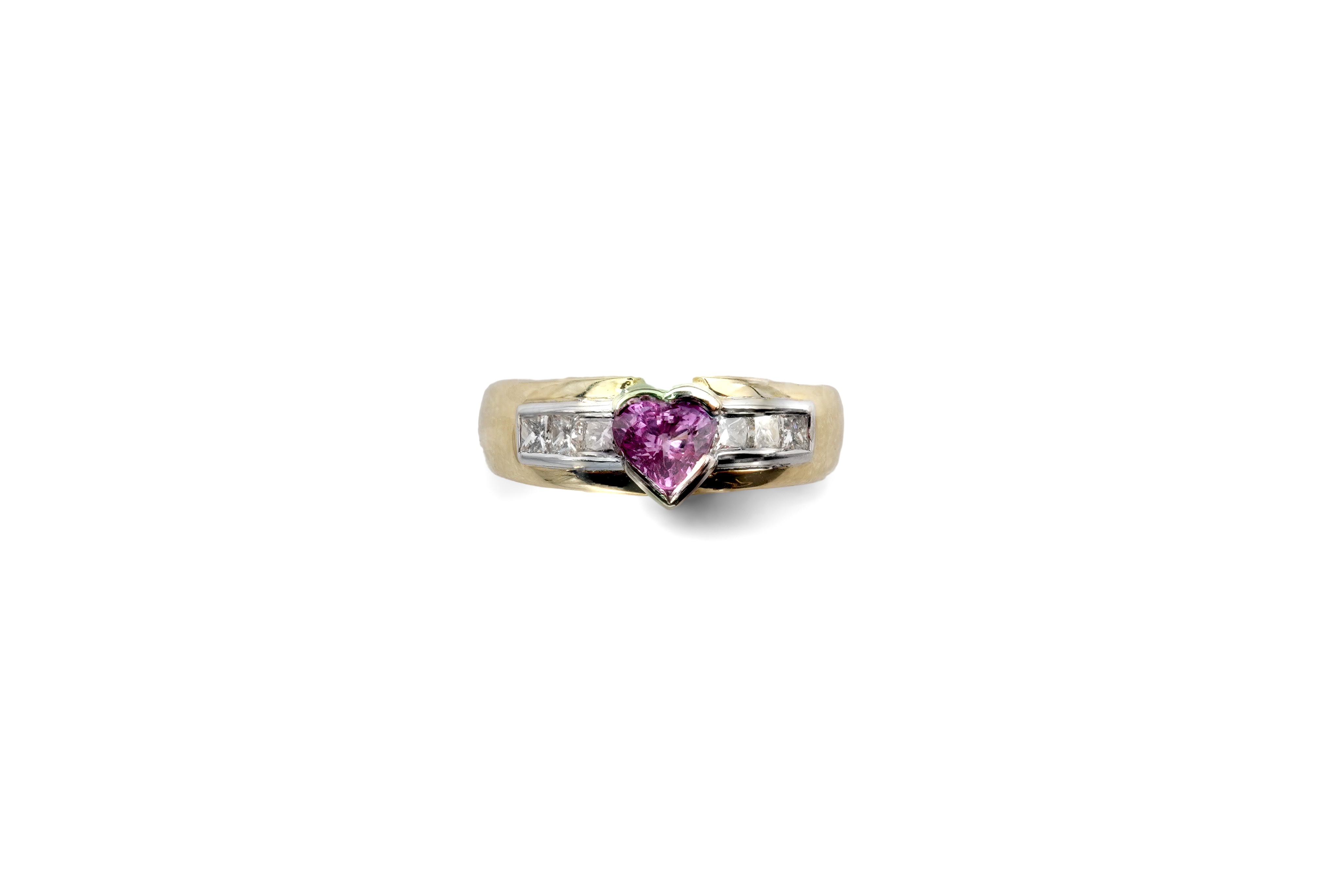 A pink sapphire and diamond ring